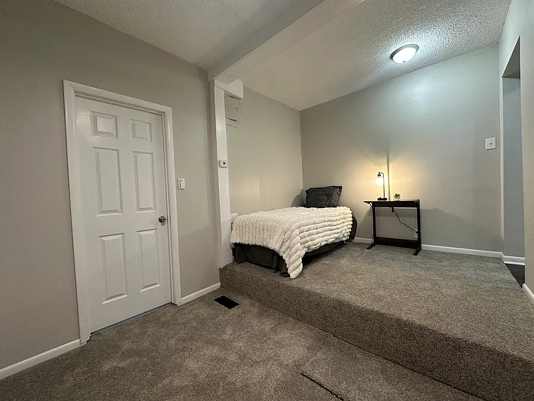 807 Unique second bedroom - freshly painted, new carpet, updated lighting with ceiling fan