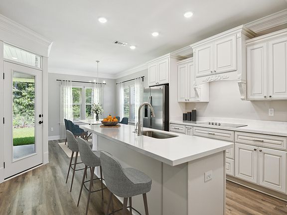 Kitchen in the Jules floorplan at a Meritage Homes community in Gulfport, MS.