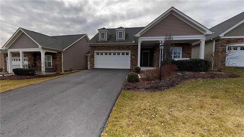 Welcome home to 164 Cobblestone Drive.