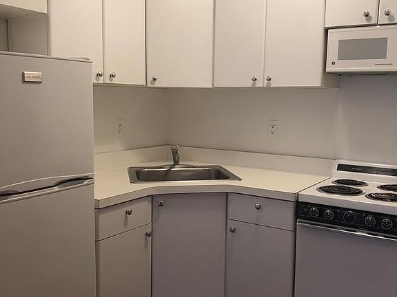 5th image of 117 W 58th St APT 2G
