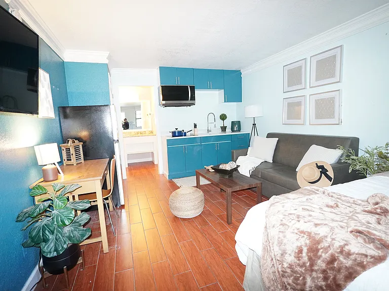 Welcome to your cozy studio retreat, complete with modern amenities and inviting decor.