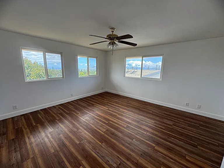 Master bedroom w/walking closet and view of West Maui