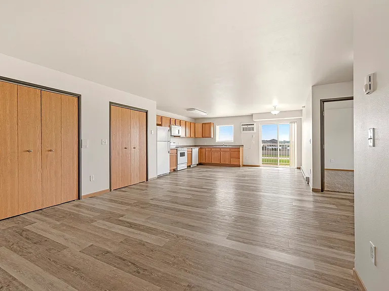 Uncover the spacious interiors of Paramount at the Bluffs Apartments, featuring modern design and ample natural light. Enjoy a comfortable living space with convenient amenities and stunning views. Schedule your tour today!