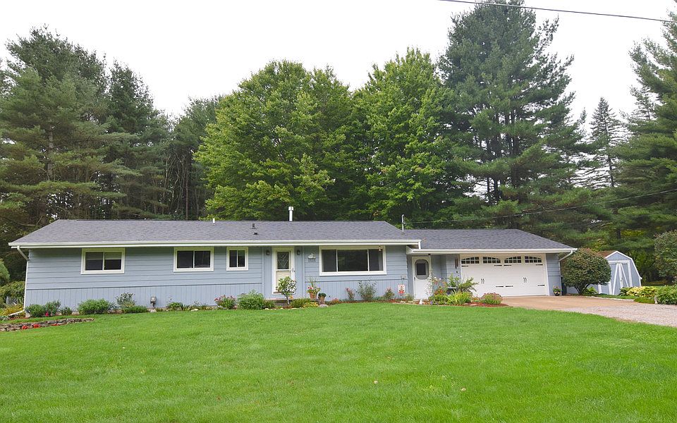 Your look is over!  Just into the country but close to everything.  This home has everything you could want with lots of updates including windows, roof, an upgraded kitchen and bath, sliding glass door to the deck, fence-in yard, main floor laundry, fire pit, 2.5 car garage.  