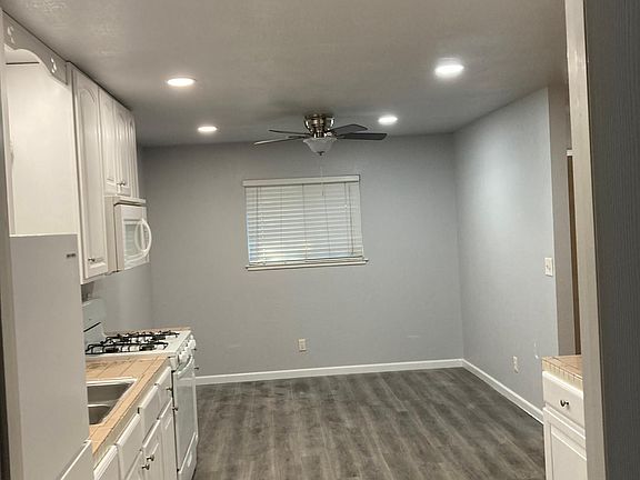 Kitchen, new floor, inset lights, fan fresh paint.