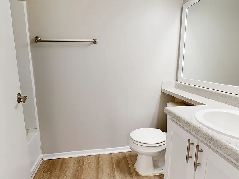 Full bathroom with shower and vanity Full bathroom with shower and vanity