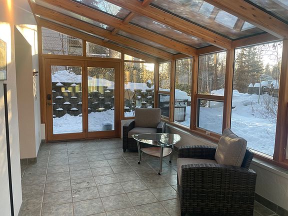 heated floor in this cozy solarium