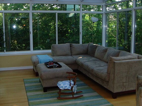 3 sided glass family room has great views of the private yard.