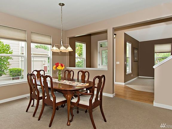 Cozy open concept family room with gas fireplace. 