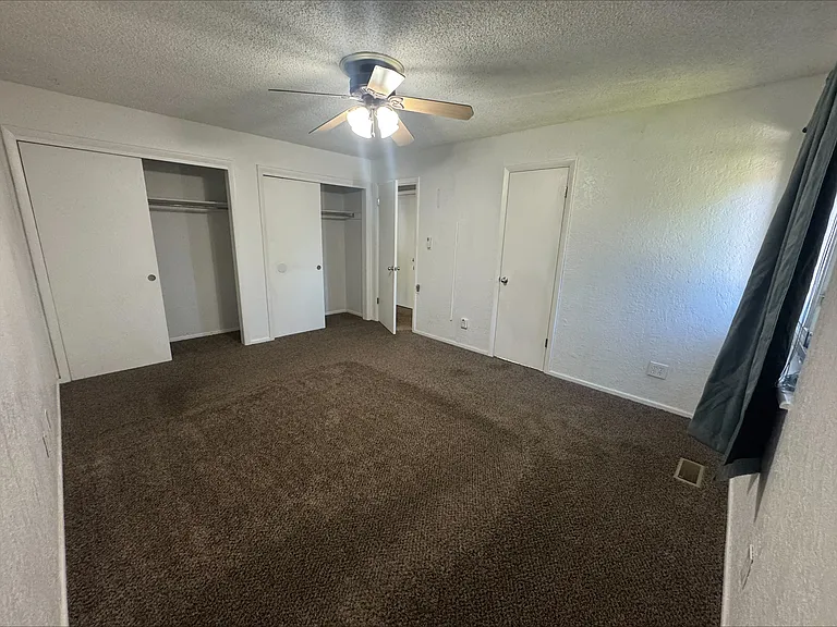 Upstairs master bedroom with double closets