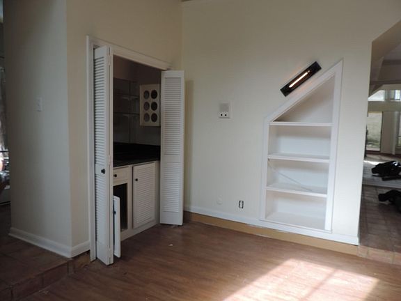 Built-in shelves and wet bar