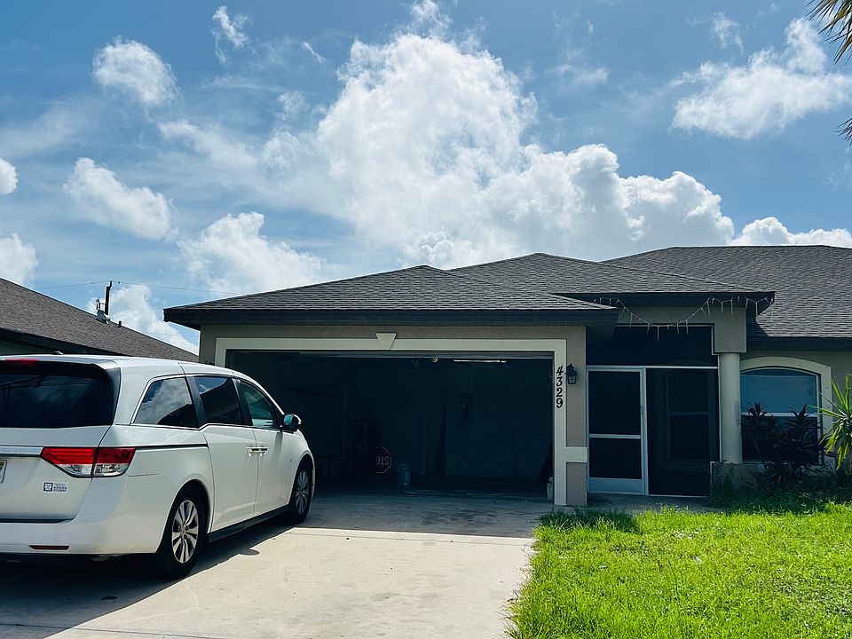 Large driveway and garage