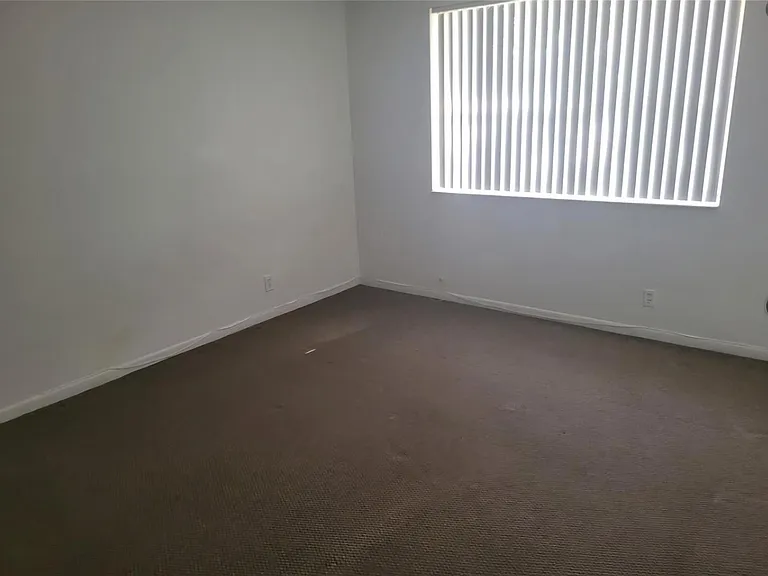 8741 Wiles Rd #305 — Photo 5