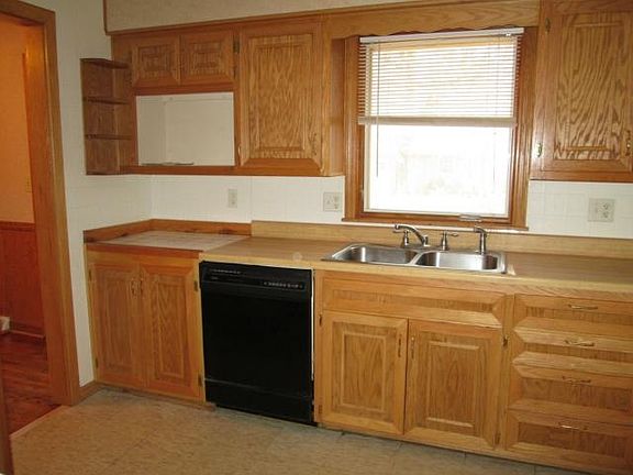 Newly updated kitchen with dishwasher and all oak cabinetry