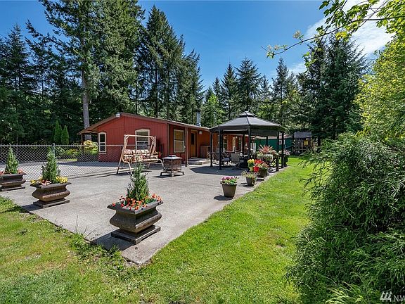The backyard and gazebo are ready for all your summer entertaining or quiet time with nature. You choose. The seller is leaving all the pots for the next owner to enjoy.