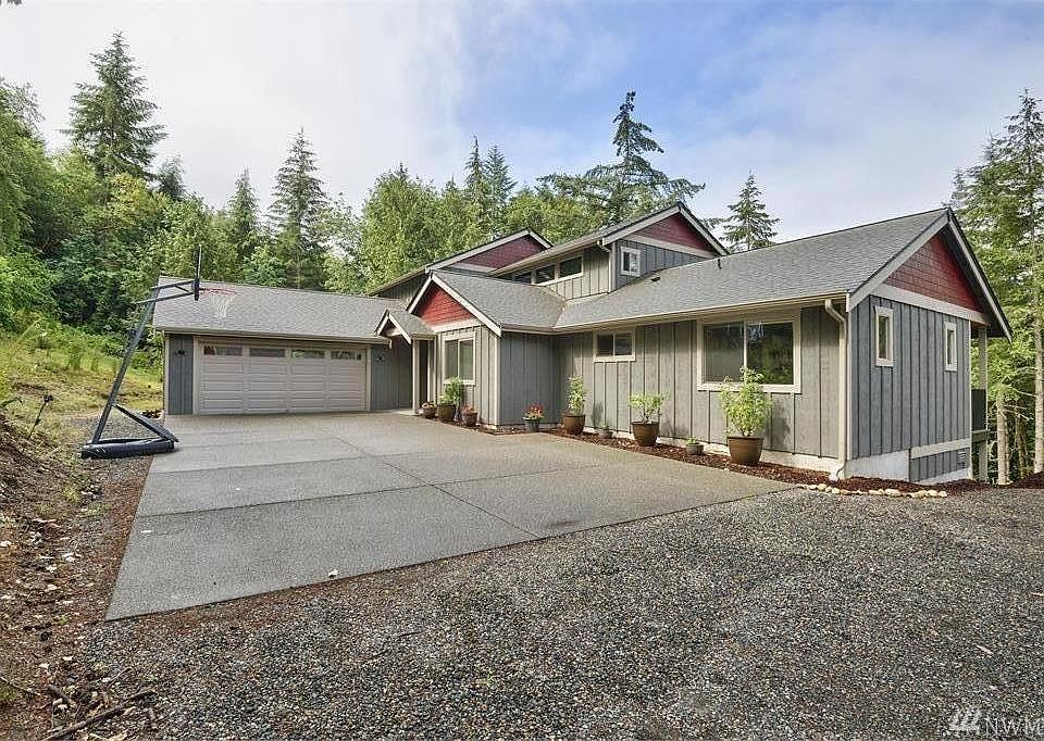 Since this photo was taken, entire driveway has been paved and retaining wall installed.