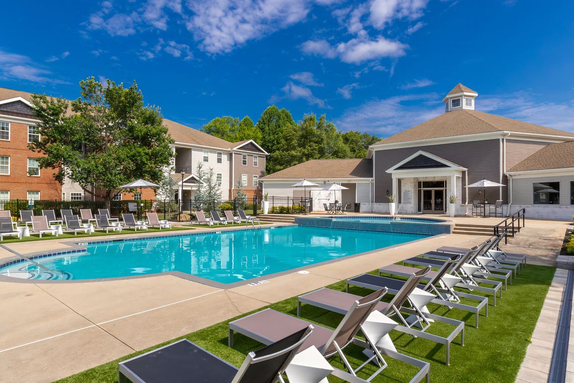 Cool off at our expansive pool featuring plenty of lounge chairs and scenic community views, professionally operated by Highlands Vista Group.