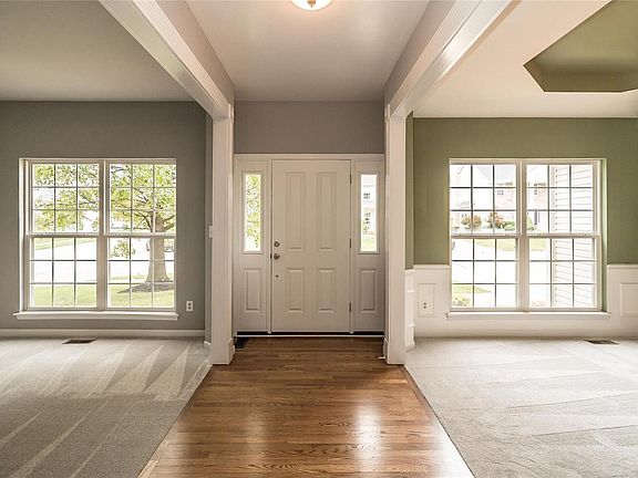 Walk into the Front Door Entry Foyer with Real Hardwood Floor. Formal Living Room to the Left and Formal Dining Room to the Righ