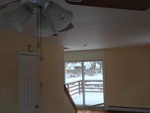 living Room with Slider to lg Deck