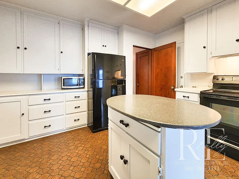 9051 Sunset Ln NW — Photo 19