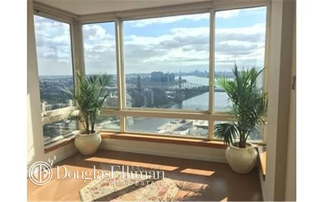 Sold by Douglas Elliman | media 36