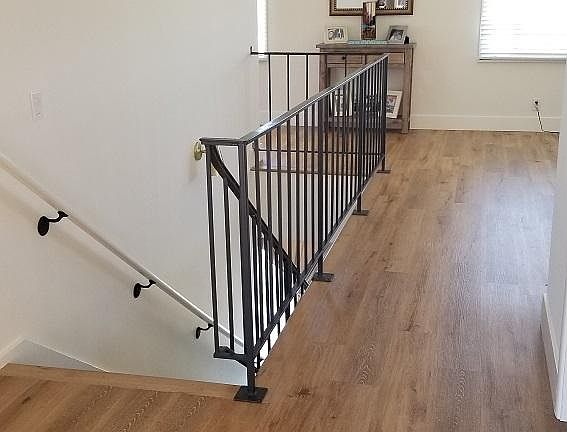 Entryway and stairs to bedrooms and backyard