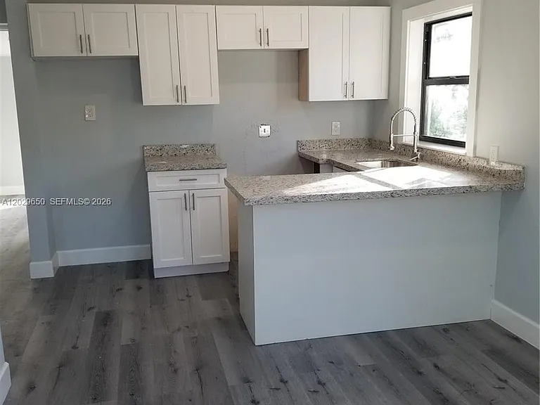 1756 NW 94th St — Photo 3