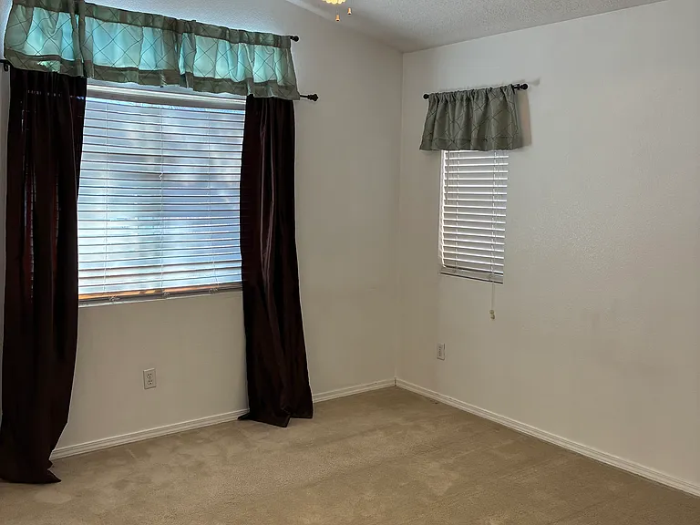 Master bedroom--large window looks out to the back yard