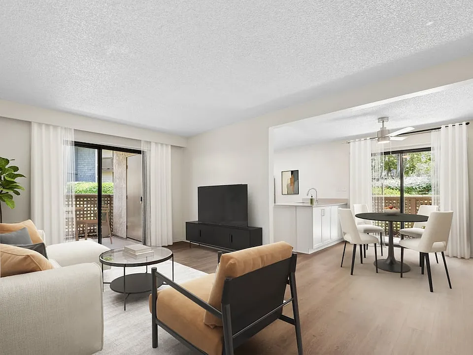 Renovated Package I living and dining room with hard surface flooring