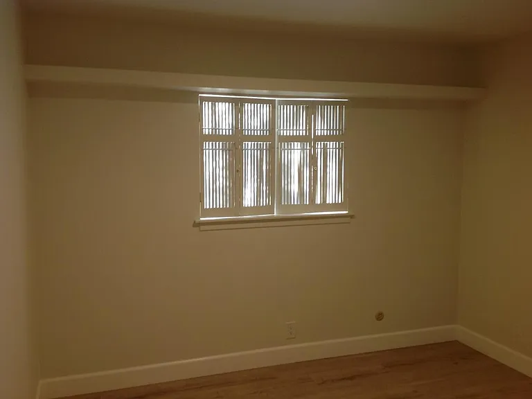 Built-in shelving and original shutters