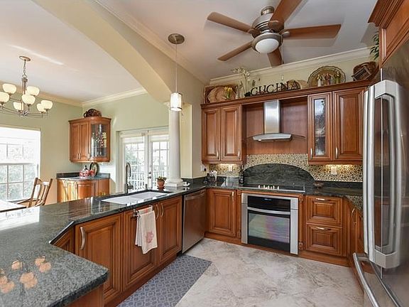 What a Kitchen! Italian Wood Cabinets. Swedish Electrolux Appliances. Nice & Bright.
