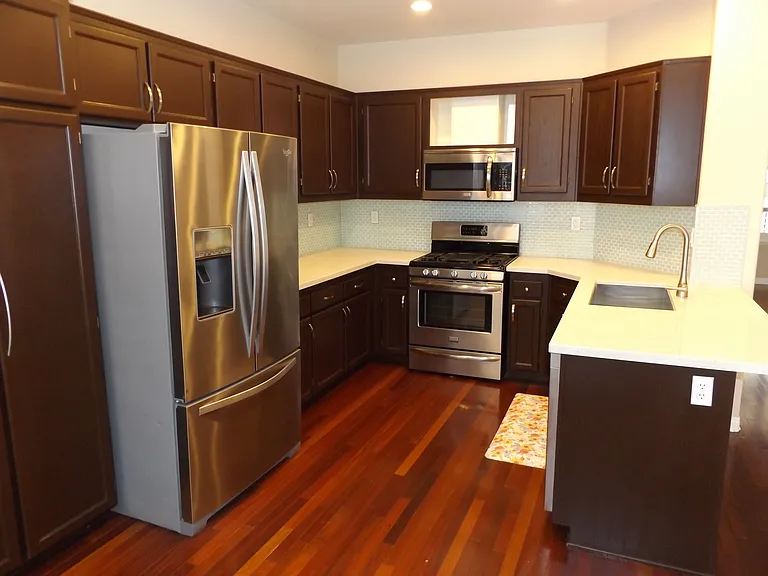 Remodeled kitchen with stainless steel appliances