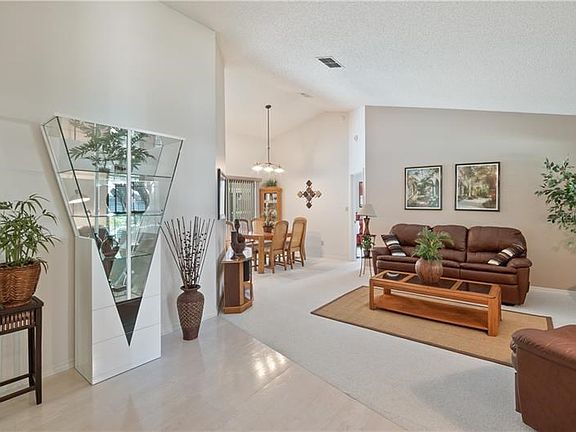 Front foyer, formal living and dining room