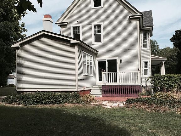 Back of house; deck off kitchen; brickpatio