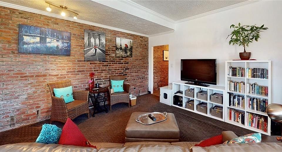 The living room area; shows entrance hall