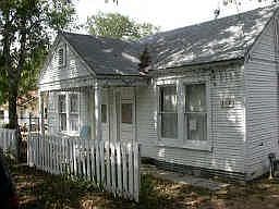 original 1930's home on front of lot