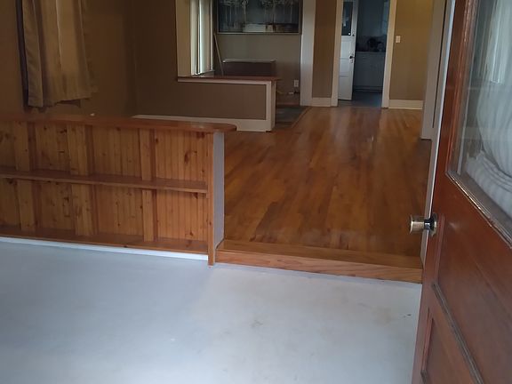 View inside front door. Step into the clean entry room where you can kick off your shoes, stash backpacks and jackets.