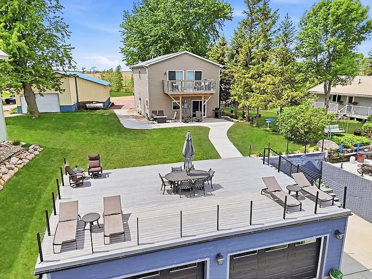 Expansive outdoor living spaces w/ comfortable outdoor seating and lounges.