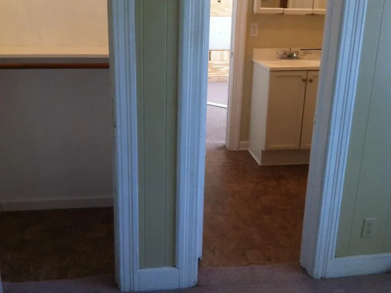 West bedroom closet and entry to bath