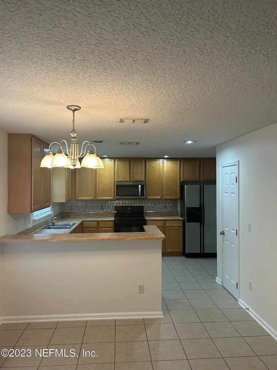 Building Photo - 1603 Canopy Oaks Dr