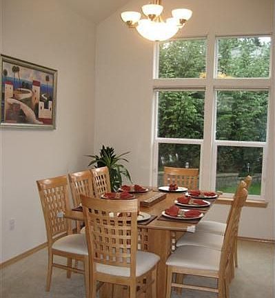 Dining & Living Room have dramatic vaulted ceilings to let in the light.