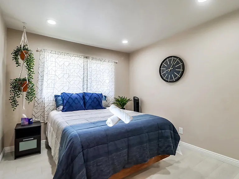 Wake up to a bright & refreshing morning on your comfy queen bed in Bedroom 3