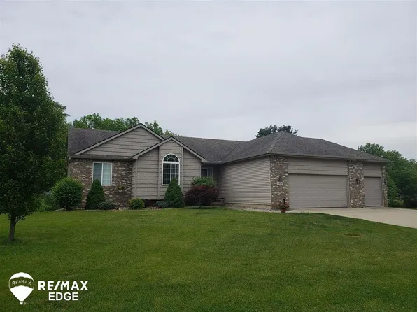 2456 Whisper Ridge Dr, Burton, MI 48509