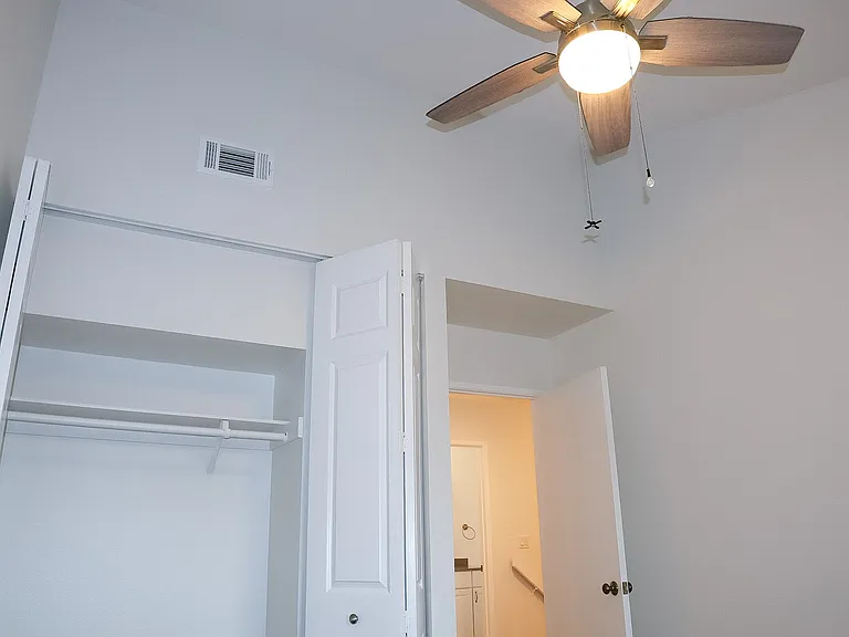 Bedroom #2 with vaulted ceilings.