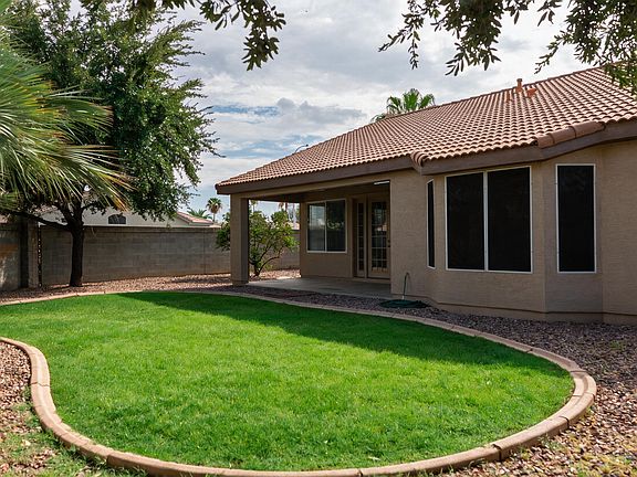 Large grass area in backyard