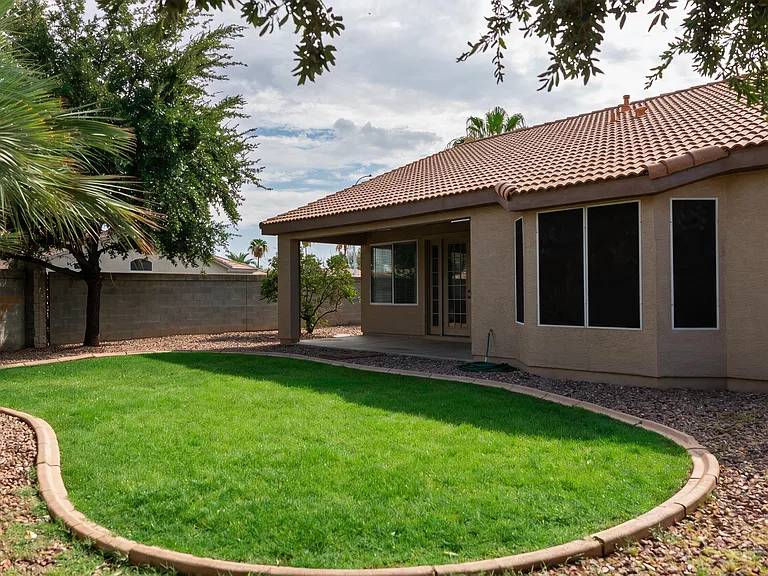 Large grass area in backyard