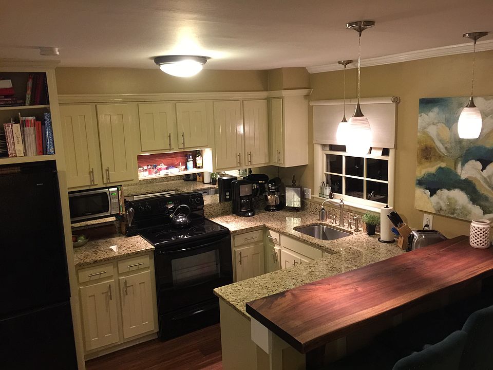 open kitchen remodeled 2014; natural wood bar