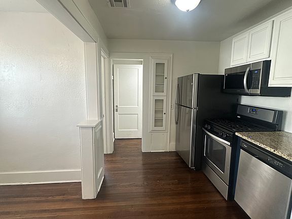 dining nook to left and kitchen to right