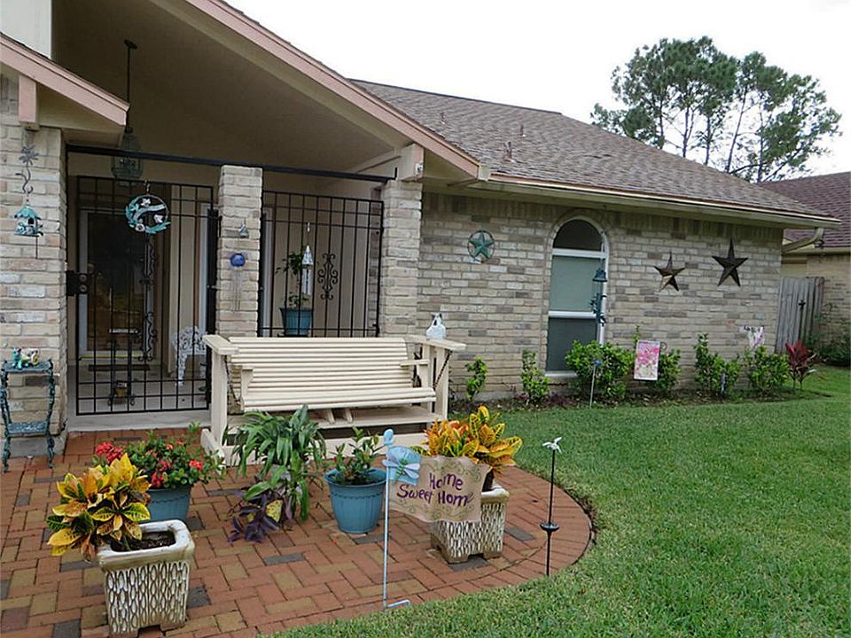 Porches and patios for outdoor enjoyment.  Nice landscaping...many blooming plants.