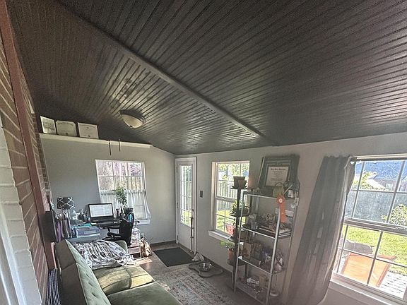 Beautiful sunroom/bonus room, great for an office or additional family room.